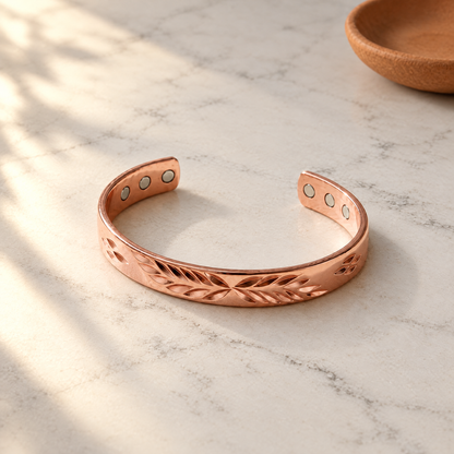 June's Lunar Copper Bracelet – pure copper bracelet on a warm neutral background - photo 1