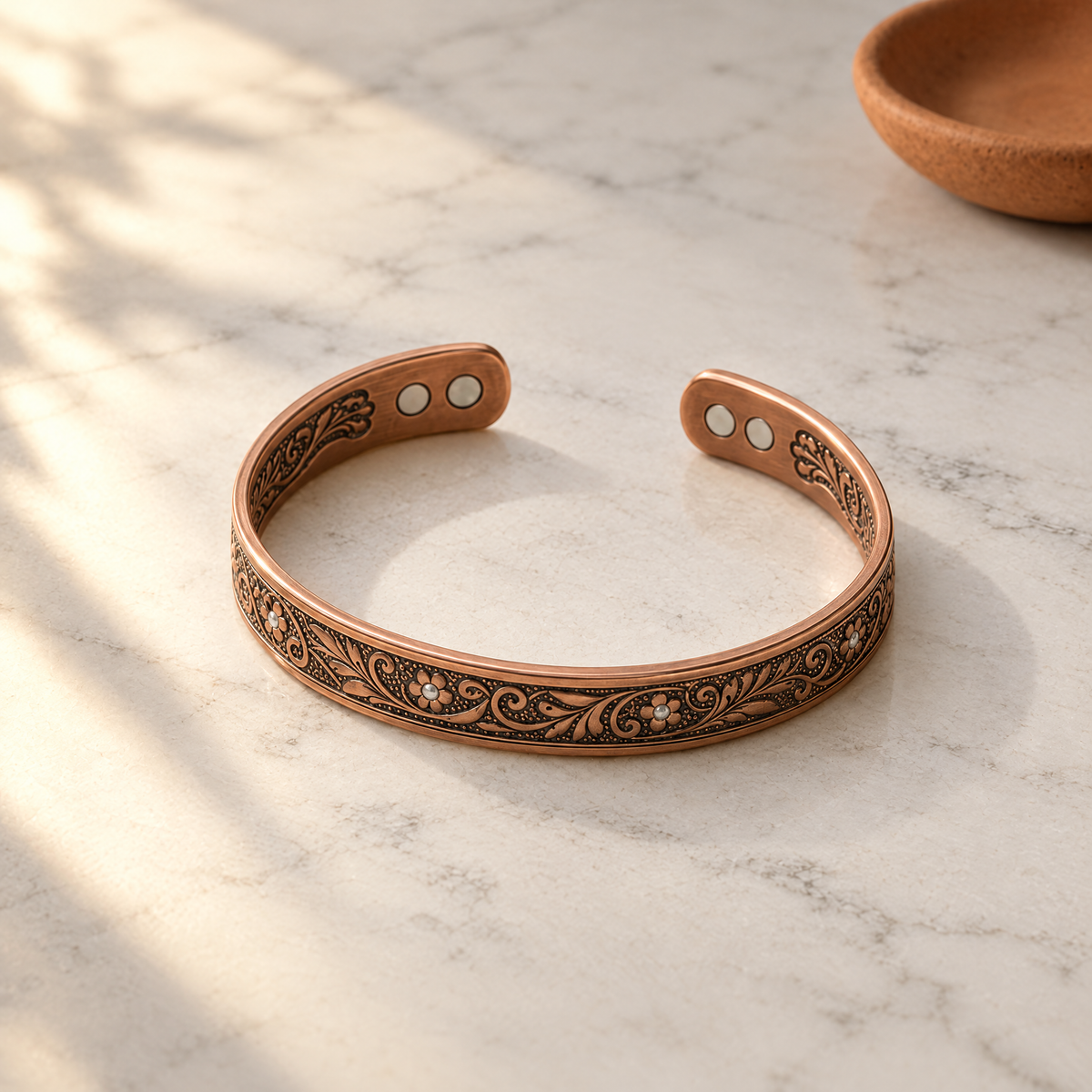 June's Sprig Copper Bracelet – pure copper bracelet on a warm neutral background - photo 1