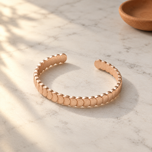 June's Tide Copper Bracelet – pure copper bracelet on a warm neutral background - photo 1