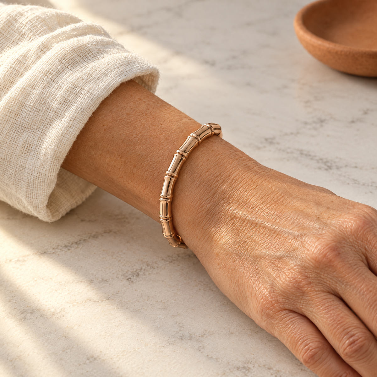 June's Grove Copper Bracelet – pure copper bracelet on a warm neutral background - photo 2